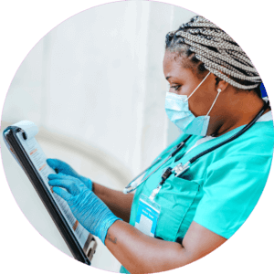 African American doctor checking a clipboard